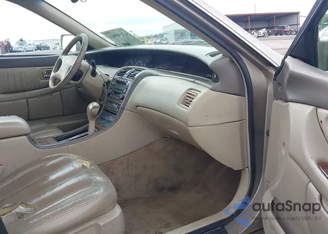 2000 Toyota Avalon Xls z USA, uszkodzony, nr VIN 4T1BF28BXYU098365